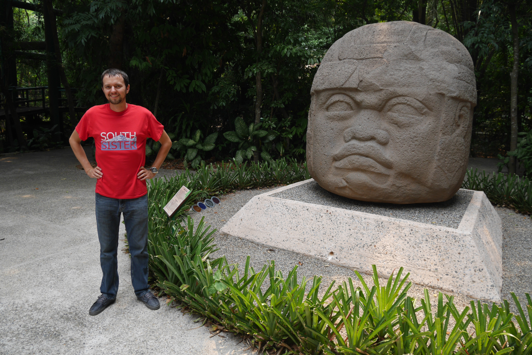 With Colossal Head No. 1 at Parque Museo La Venta, Villahermosa, Tabasco, southern Mexico.
