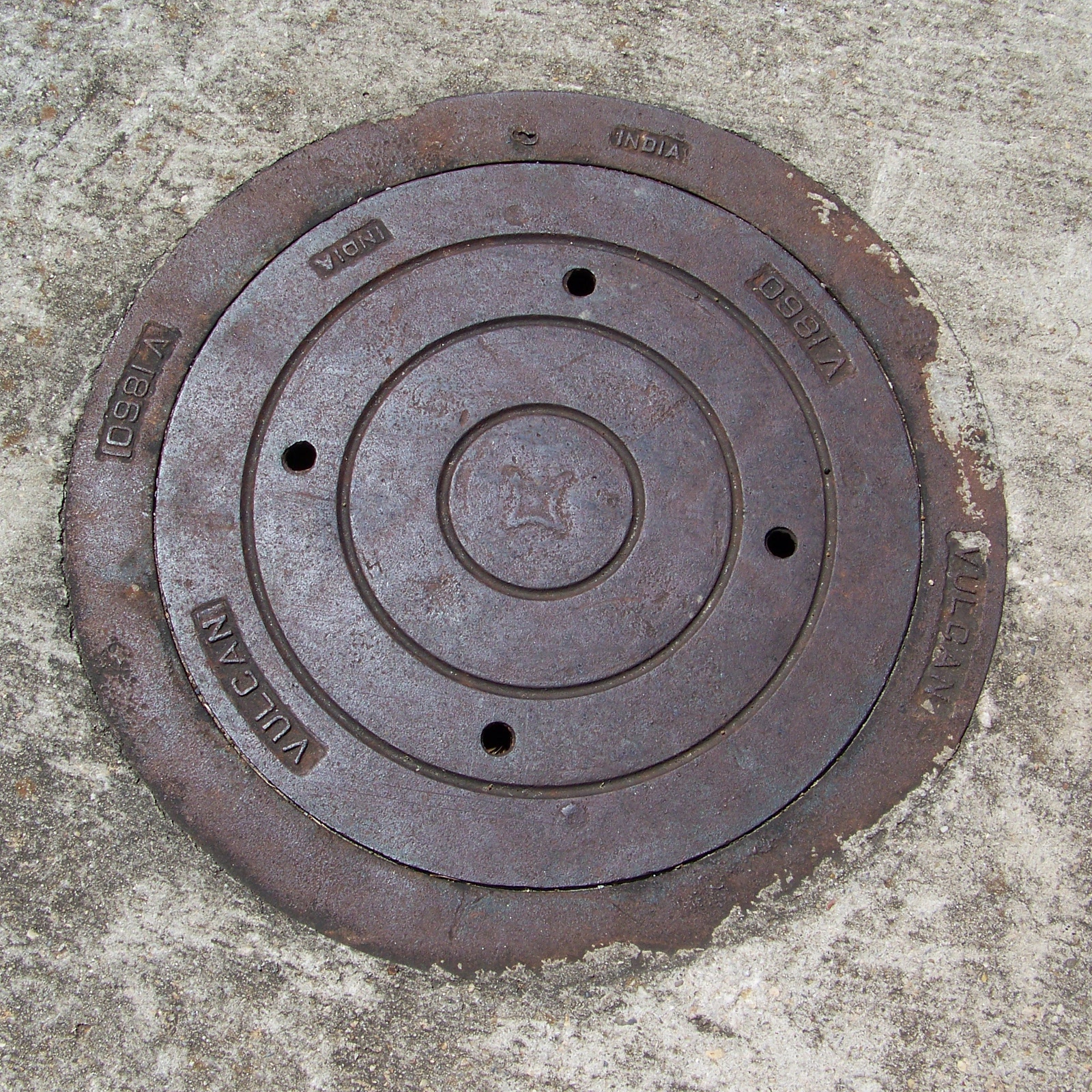 Indian-made manhole cover in the Alabama steel belt.
