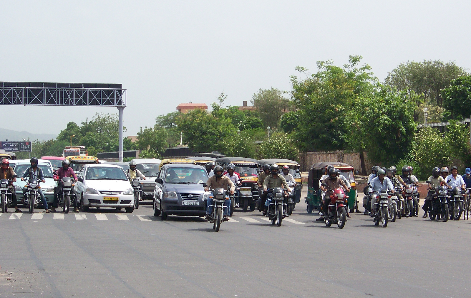 Motorcycles waiting at a light on Jawaharlal Nehru Marg, Jaipur.
