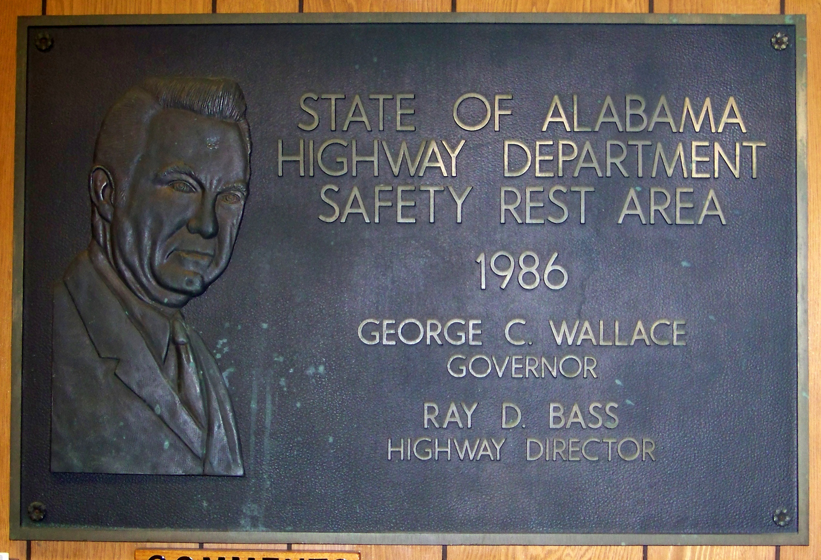 Plaque with George Wallace's likeness at rest area on I-85.