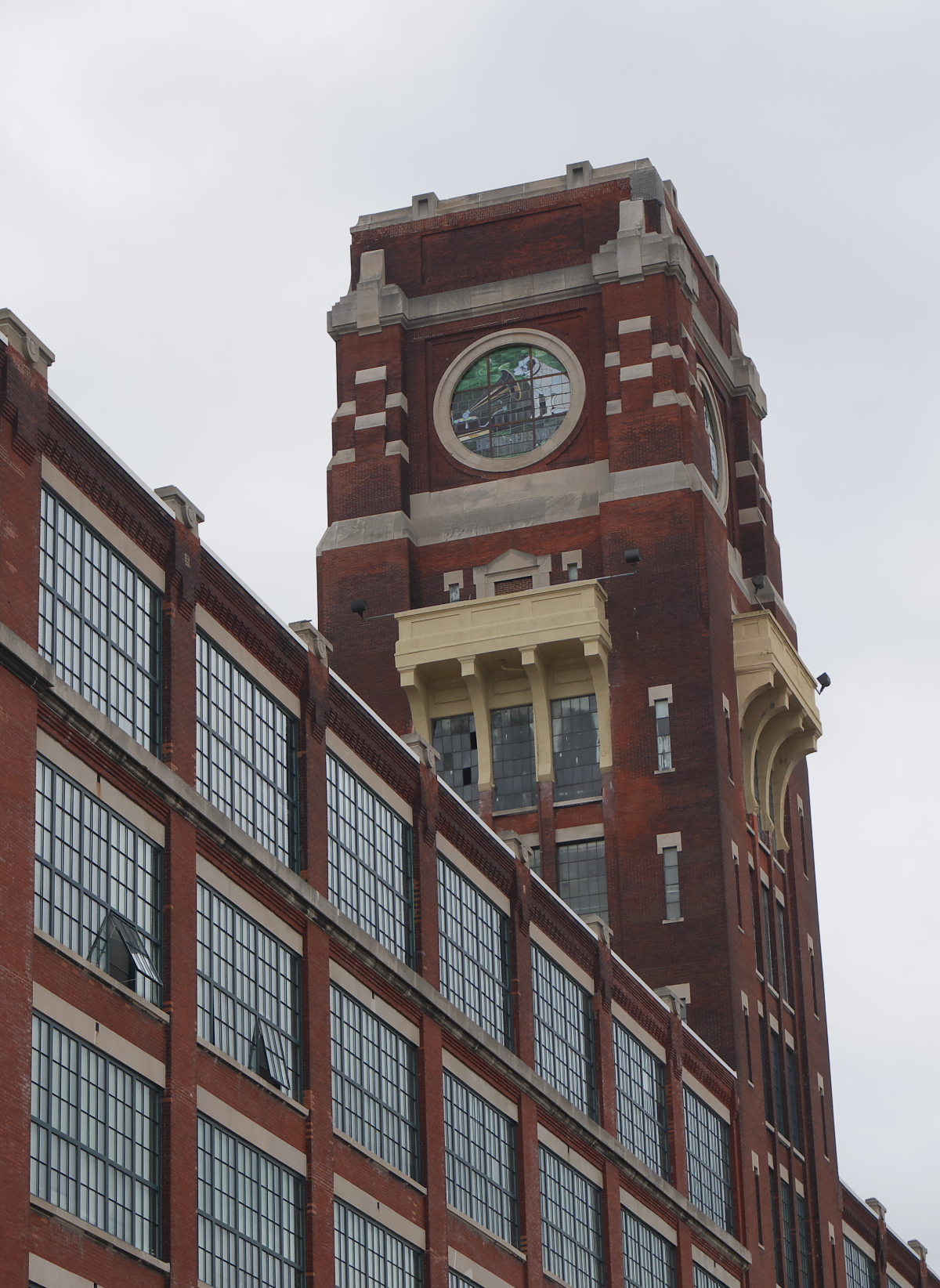 Detail of the tower of the RCA factory, with the company's logo in stained glass.
