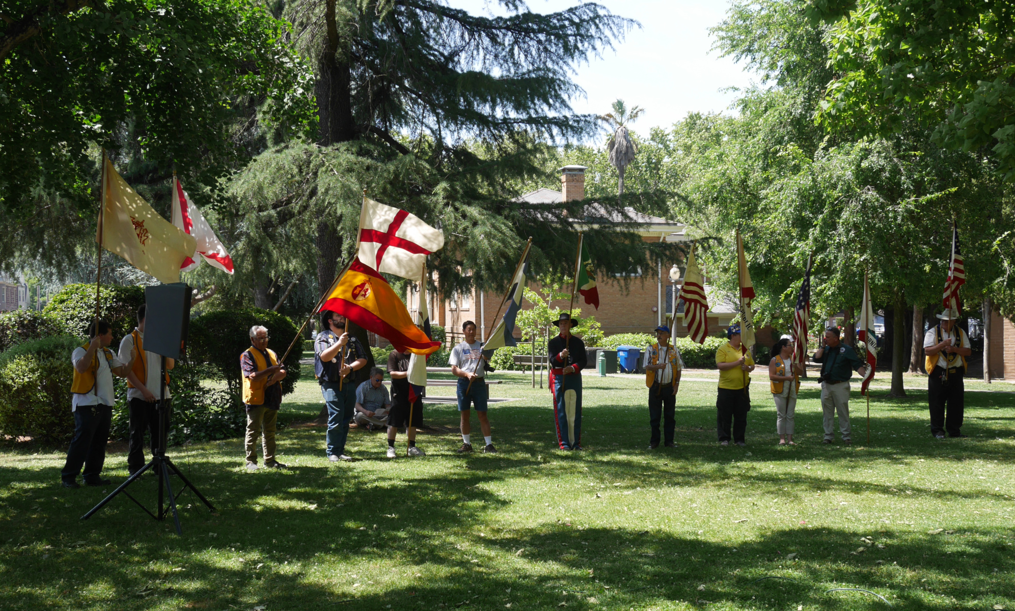 A lineup of historic flags in at the Bear Flag Ceremony. States of the United States that were once ruled by either Mexico or France really like to commemorate this fact.