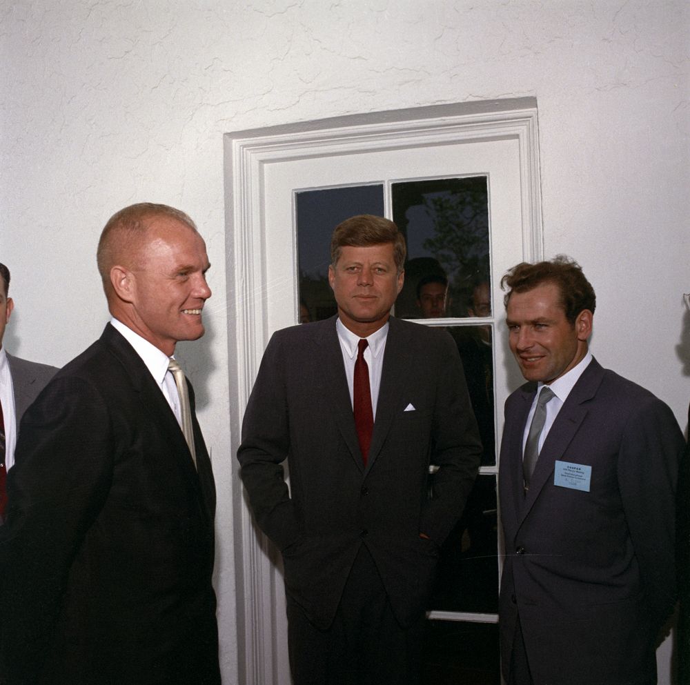 President Kennedy visits with American astronaut John Glenn (L) and Russian cosmonaut Gherman Titov (R) at the White House in 1962. At 25, Titov was the youngest person ever to fly into space. In 1998, John Glenn would become the oldest spacefarer, flying on the Space Shuttle at age 77. (Source: JFK Library)
