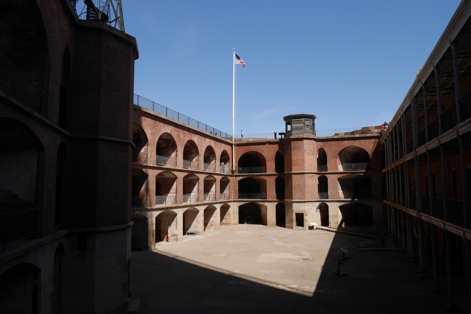 View of the parade ground inside Fort Point. The three arched tiers around the courtyard are the casemates, where the guns were mounted to protect against enemy ships.