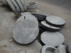 Concrete manhole covers.
