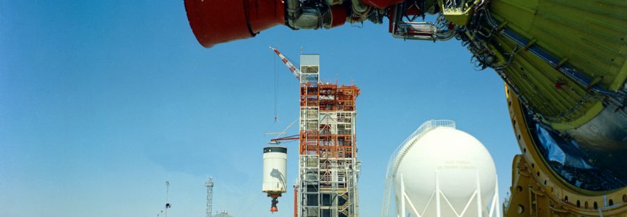 S-IVB-504 BEING INSTALLED IN BETA STAND NO. 1. S-IV-B-209 ON TRANSORTER IN FOREGROUND.